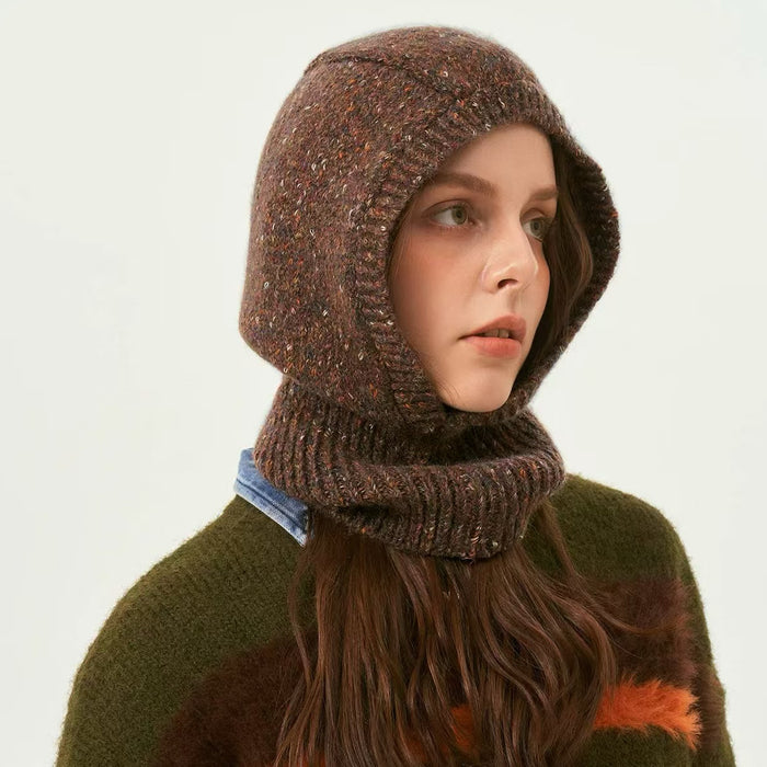Woman wearing a brown speckled wool blend knit balaclava hat, providing full head and neck coverage.