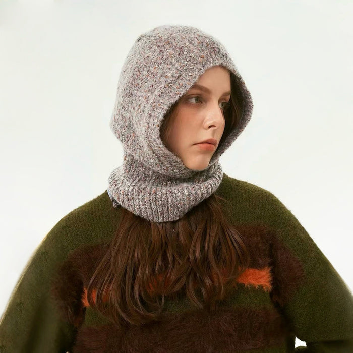 Side view of Model wearing Speckled Yarn Knit Balaclava Hat in grey, highlighting the soft wool blend.