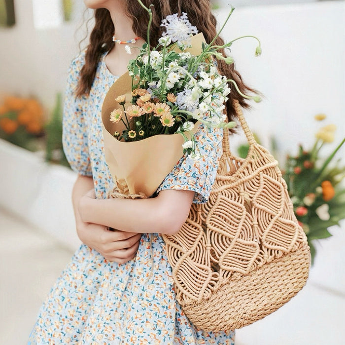 Model carrying a camel Spiral Pattern Hollow Crochet Bag on shoulder, easy for commuting and weekends.