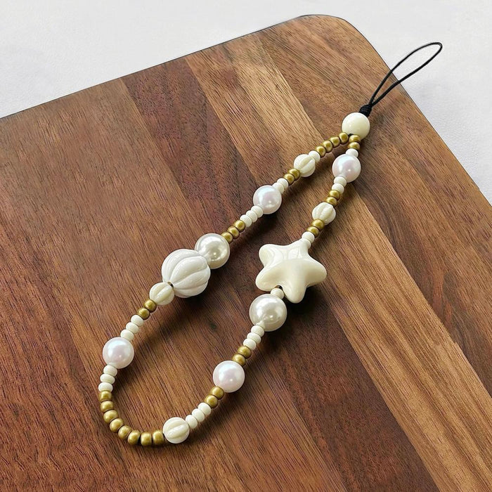Front view of Starry Pearl Delight Phone Charm, ideal for everyday outfits and street style.
