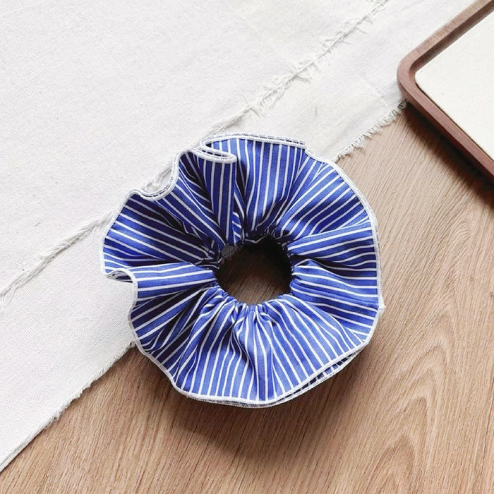 Front view of Striped Layered Scrunchie in navy blue and white.
