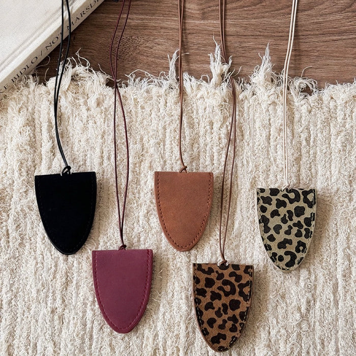 Front view of 5 pieces of Suede Arrow Eyeglass Holders with different colors.