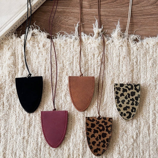 Front view of 5 pieces of Suede Arrow Eyeglass Holders with different colors.