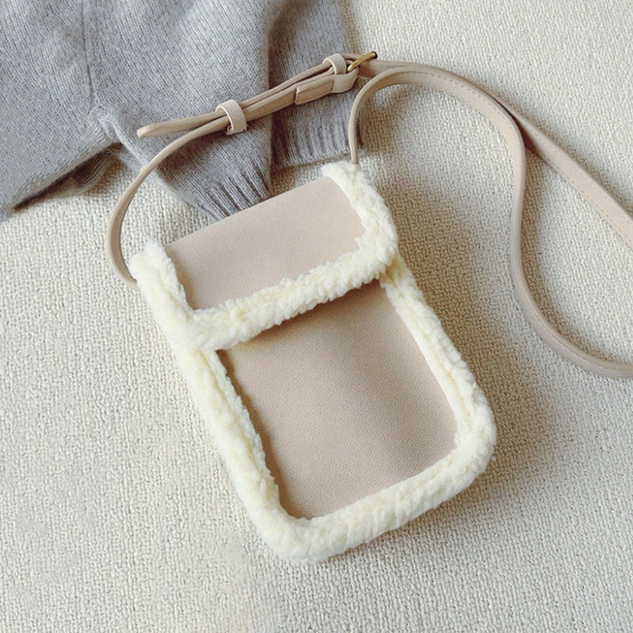 Front view of apricot Suede Crossbody Bag With Plush Trim, ideal for errands and gifting.