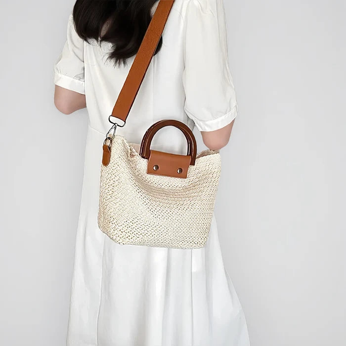 Model carrying a white polyester bag on her shoulder, easy for commuting and weekends.