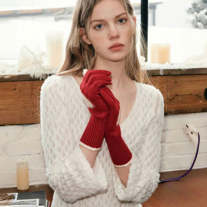Flat lay sweetheart knitted gloves in red with heart motif; soft knit warmth for everyday winter wear.