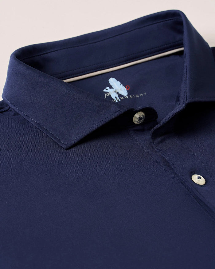Swing Performance Polo in Navy - Madison's Niche