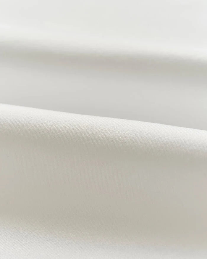 Swing Performance Polo in White - Madison's Niche