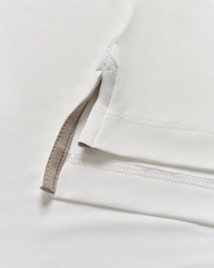 Swing Performance Polo in White - Madison's Niche
