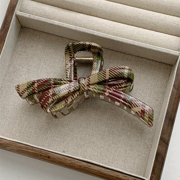 Front view of bowknot style Tartan Elegance Hair Claw , easy for workdays and special occasions.