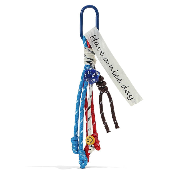 Close-up of Tassel Strings Bag Charm in blue, ideal for travel and daily use.