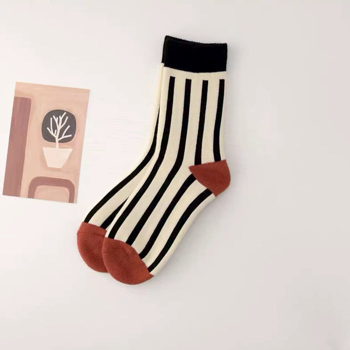Angled view of Thick Retro Socks with stripe pattern, great for daily wear and lounging.