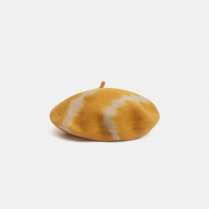 Vibrant yellow and white tie-dye wool beret for a bright accent.