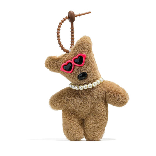 Front view of Brown bear bag charm with pink heart sunglasses and pearl necklace, great for everyday.