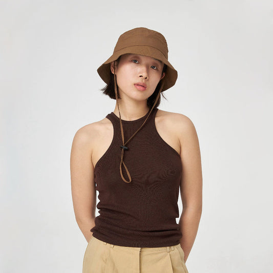 Woman wearing brown nylon ultralight quick-dry bucket hat with an adjustable windproof cord for hiking.