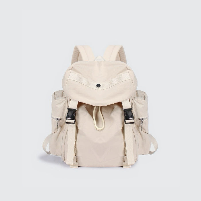 Flat lay of Ultralight Urban Daily Backpack  in beige, great for everyday carry and travel.