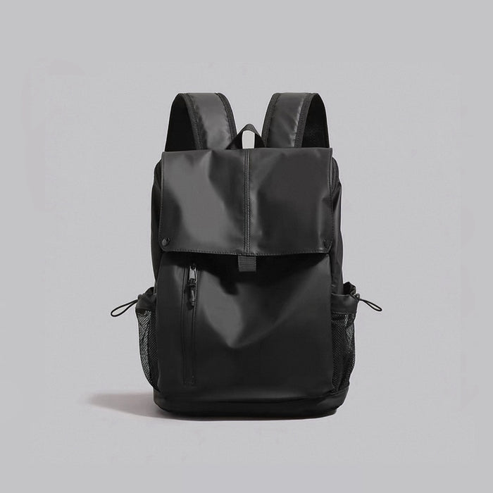 Front view of the black water-resistant Oxford flap backpack with front zip pocket.