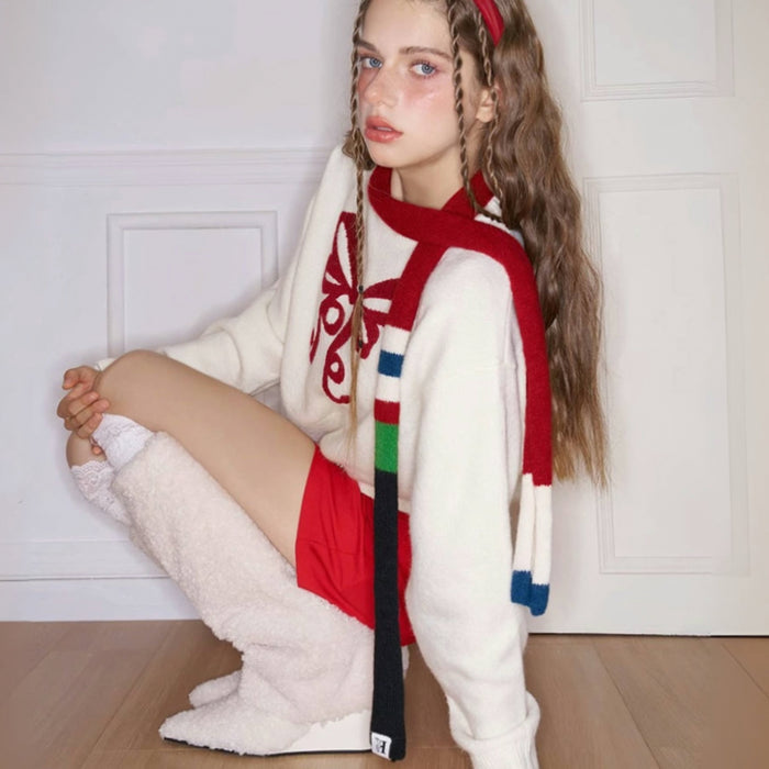 Model wearing a polyester scarf in white and black and red, easy for weekend styling and gifting.