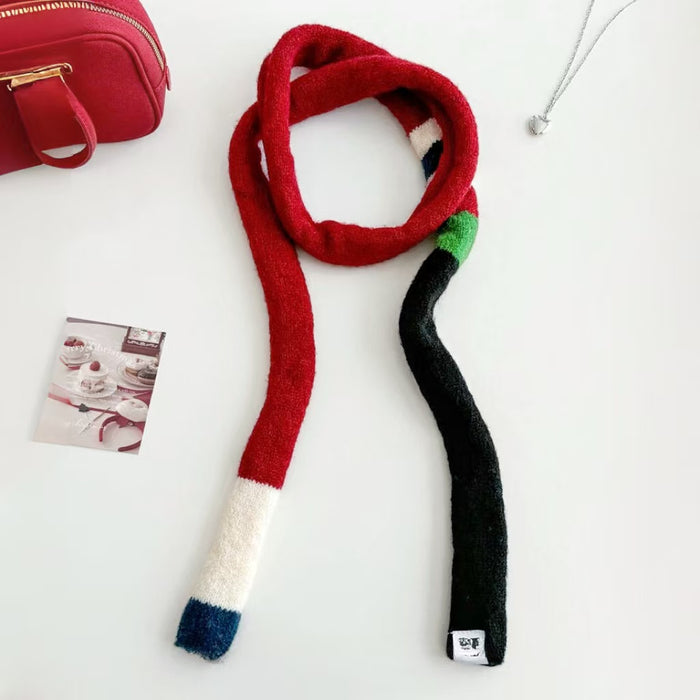 Angled view of Vibrant Colorblocked Skinny Scarf, great for office layering and commuting.