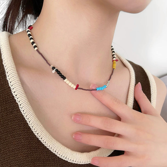 Model wearing Vivid Hue Beads Necklace in TwistPop, ideal for date nights.