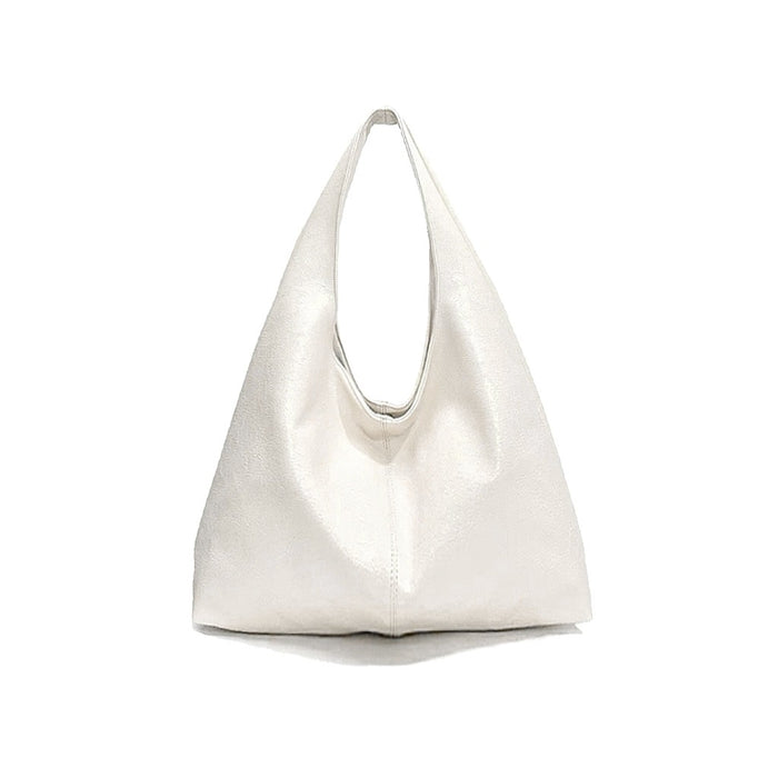 Classic white waxed leather hobo bag showing its soft and slouchy shape.