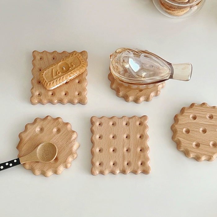 Angled view of 5 pieces of Wooden Biscuit Coasters, great for home decor and gifting.