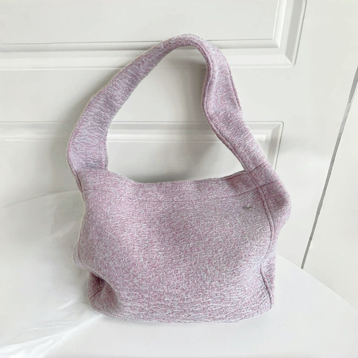 Close-up of Woolish Cozy Tote Bag with a textured finish in light purple.