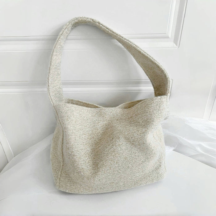 Front view of Woolish Cozy Tote Bag in beige, ideal for errands and gifting.
