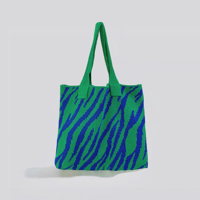 Front view of Zebra Print Knitted Tote Bag in blue and green, ideal for errands and gifting.